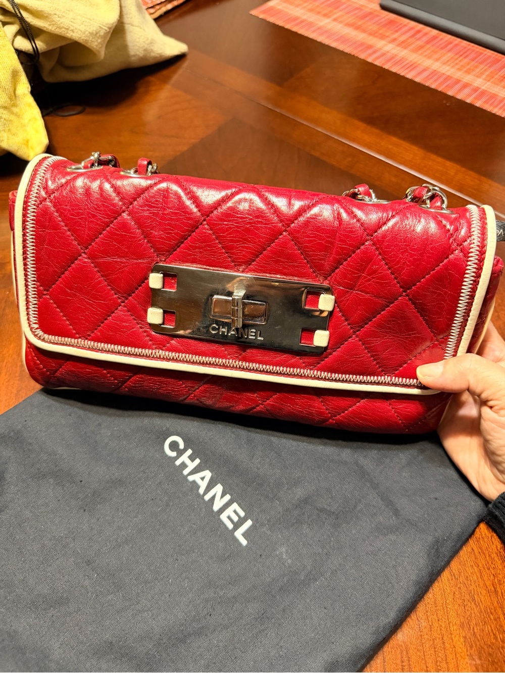 CHANEL Quilted Red Leather Shoulder Bag with Cream Trim and Silver Plate